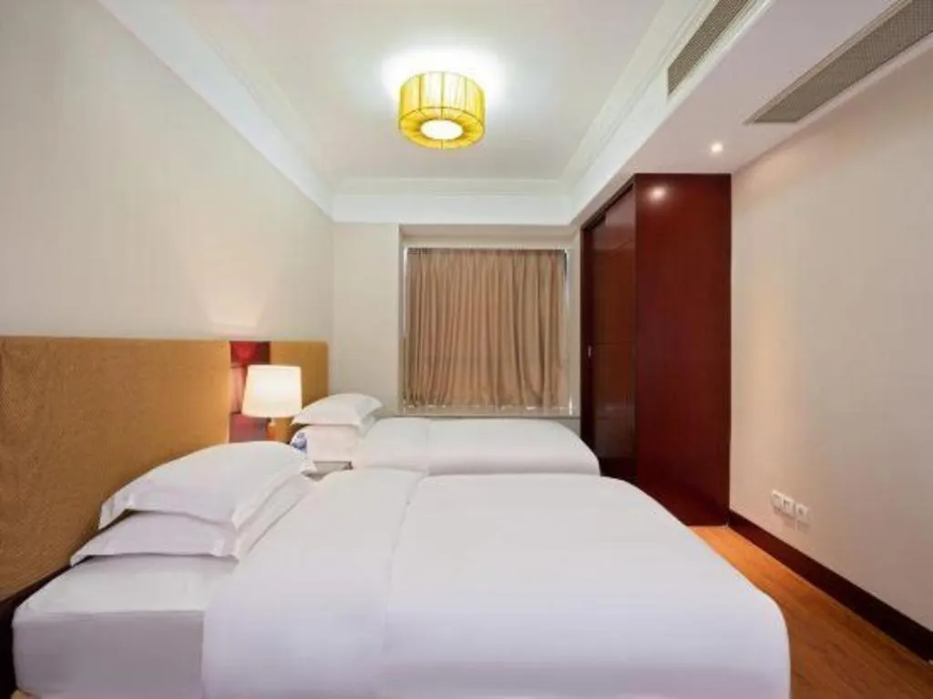 Bed in Golden Diamond Hotel Zhongshan