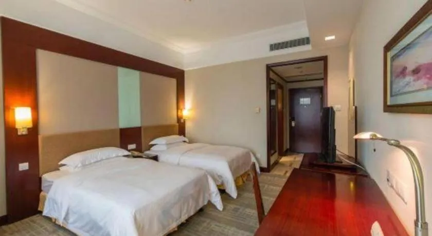 Bed in Golden Diamond Hotel Zhongshan