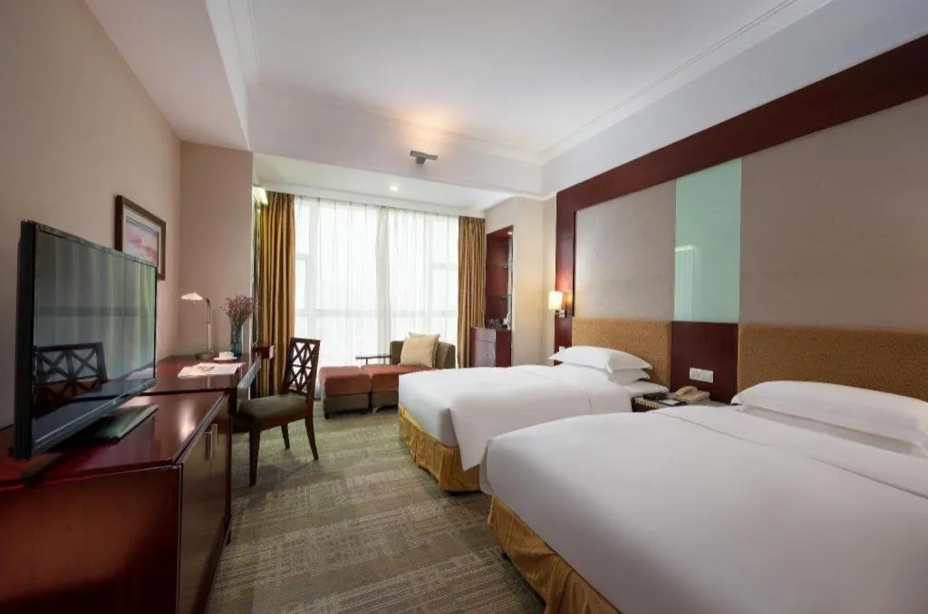 Bed in Golden Diamond Hotel Zhongshan
