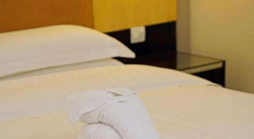 Bed in Golden Diamond Hotel Zhongshan