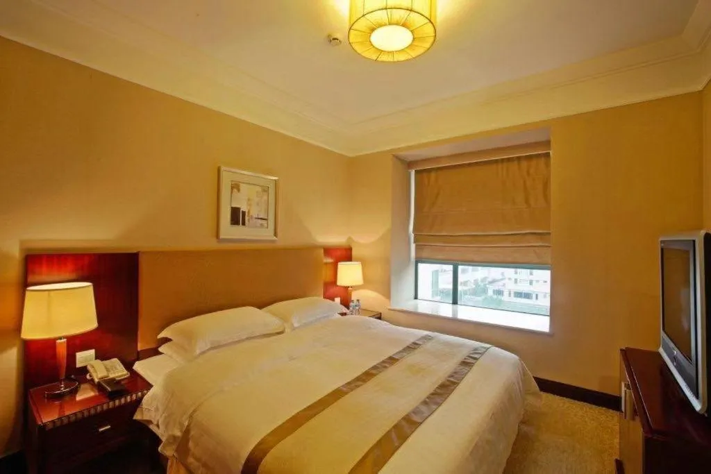 Bed in Golden Diamond Hotel Zhongshan