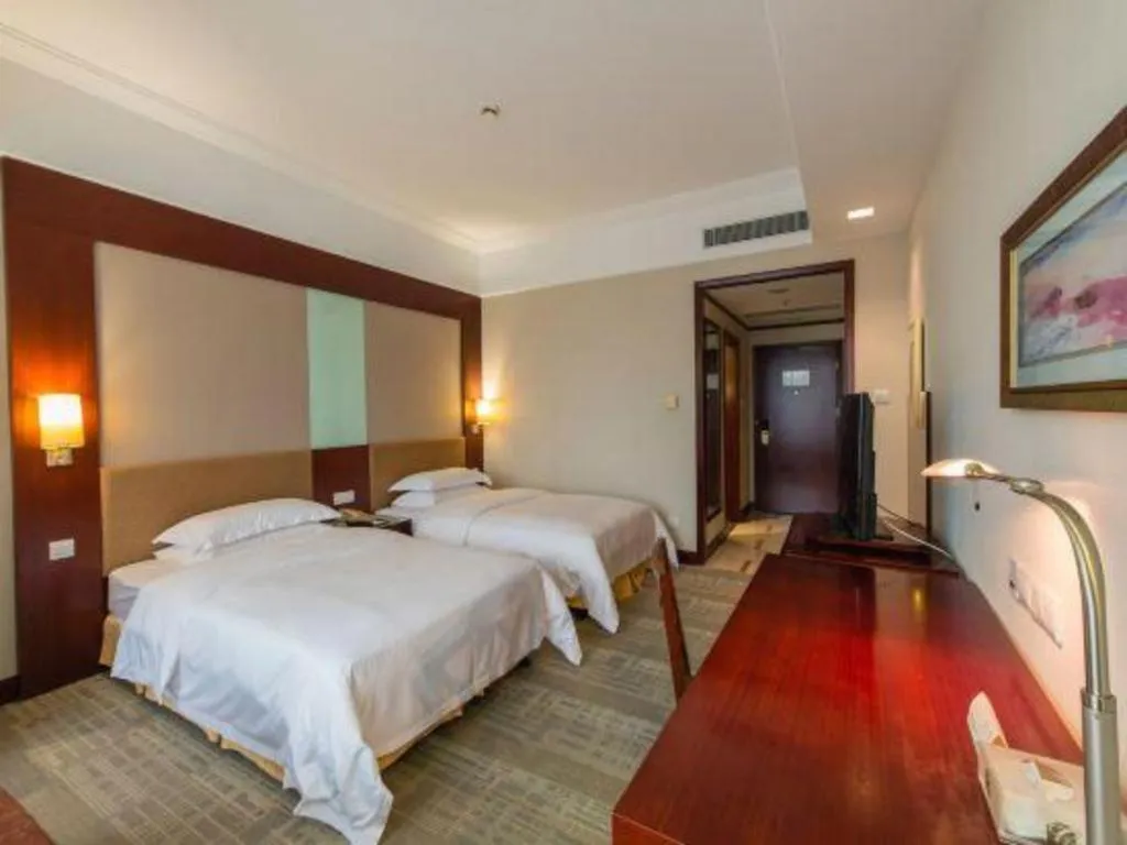 Bed in Golden Diamond Hotel Zhongshan