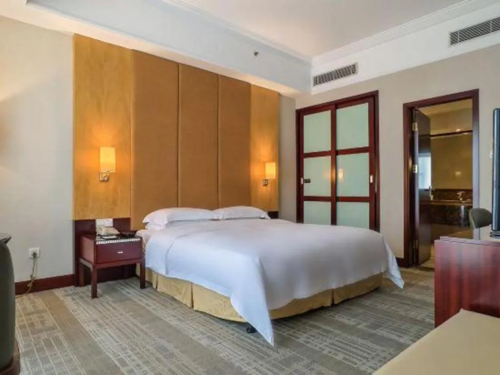 Bed in Golden Diamond Hotel Zhongshan