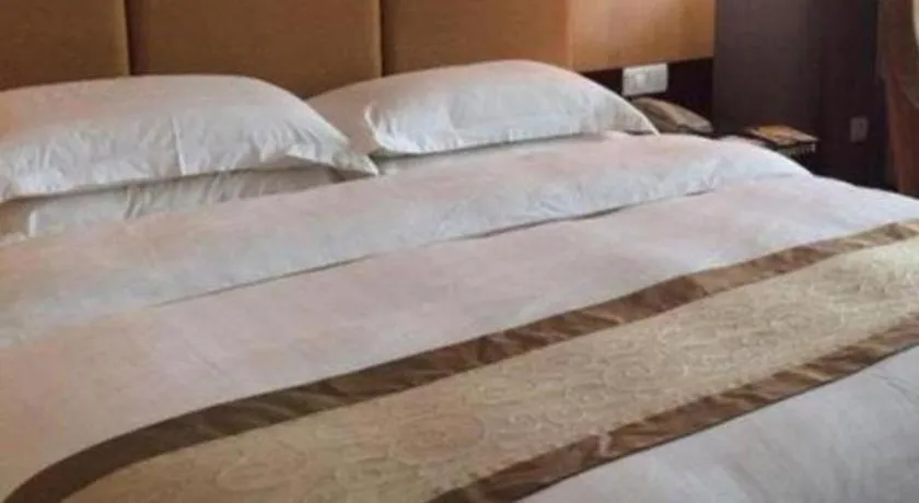 Bed in Golden Diamond Hotel Zhongshan