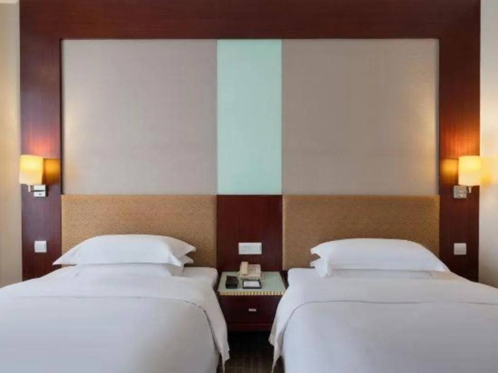 Bed in Golden Diamond Hotel Zhongshan