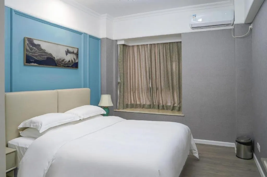 Bed in Golden Diamond Hotel Zhongshan