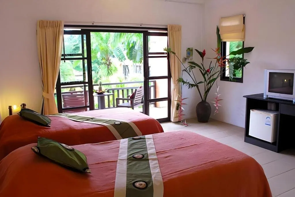 Bed in Khaolak Palm Hill Resort