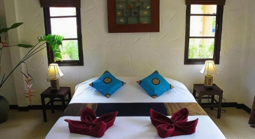 Bed in Khaolak Palm Hill Resort