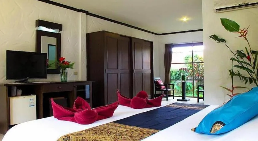 Bed in Khaolak Palm Hill Resort