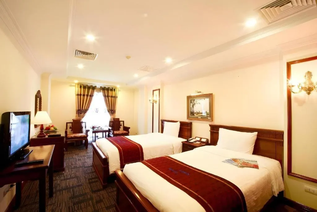 Bed in Eden Hotel Hanoi