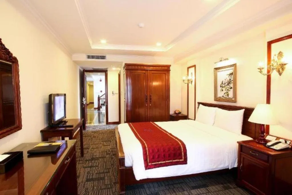 Bed in Eden Hotel Hanoi