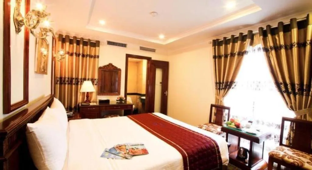 Bed in Eden Hotel Hanoi