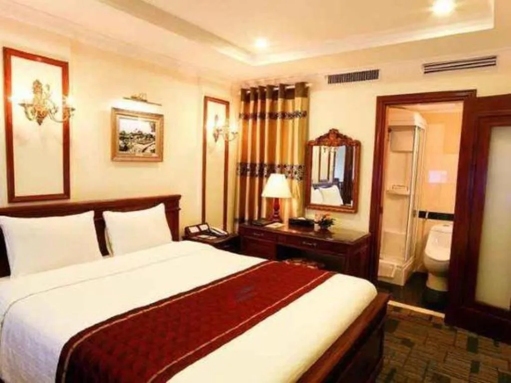 Bed in Eden Hotel Hanoi