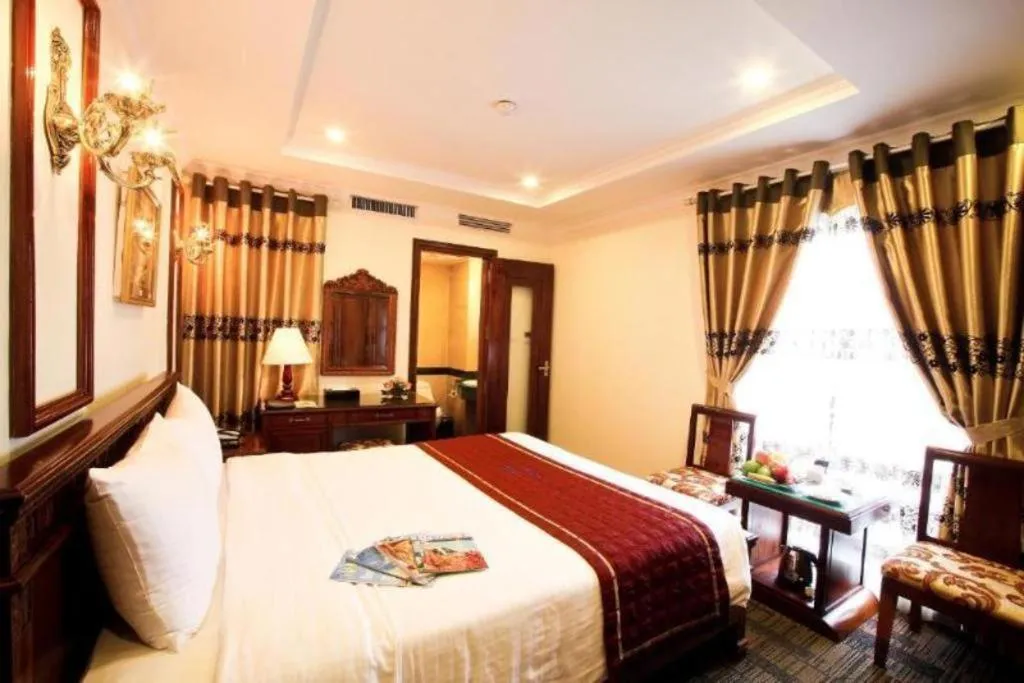 Bed in Eden Hotel Hanoi