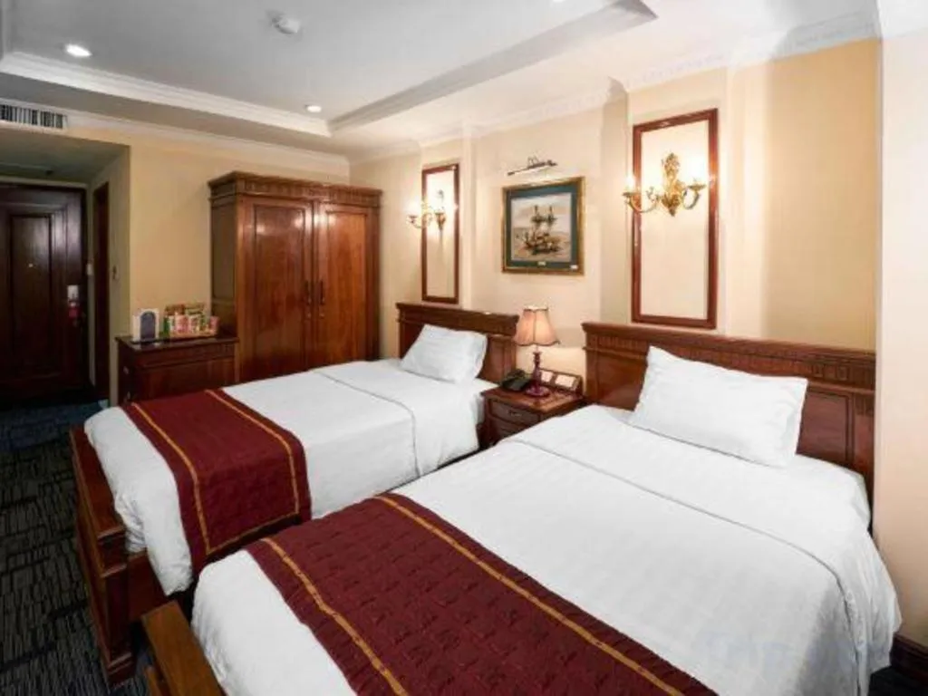 Bed in Eden Hotel Hanoi