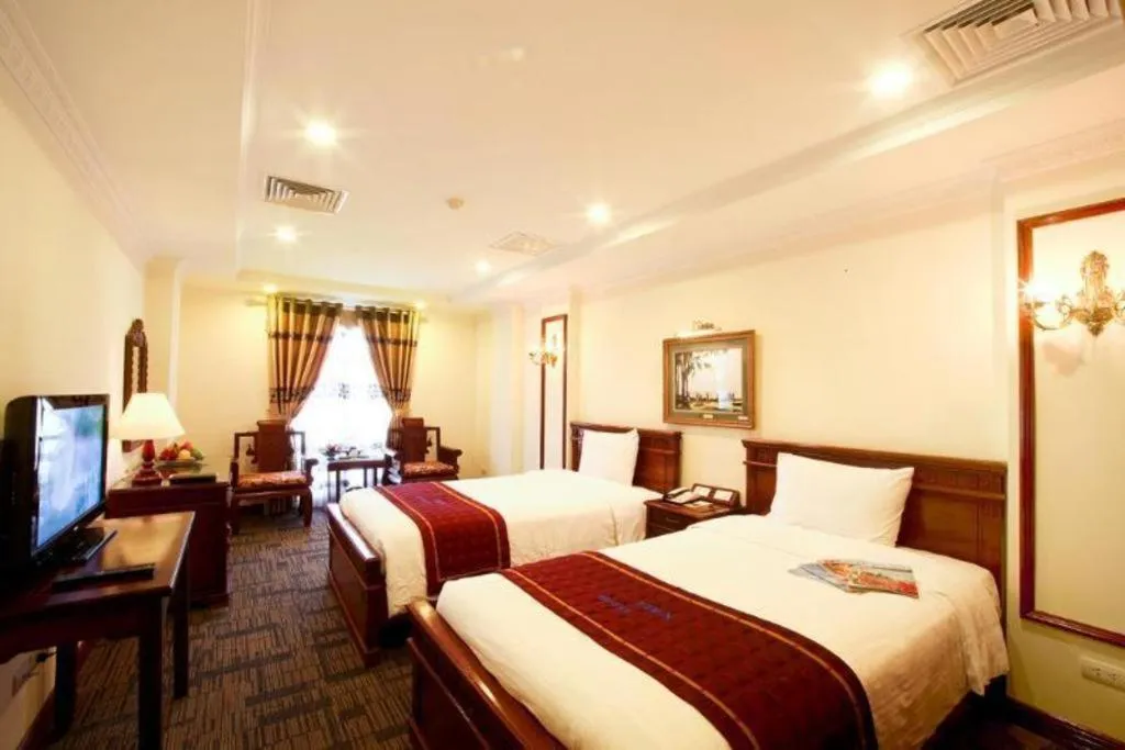 Bed in Eden Hotel Hanoi