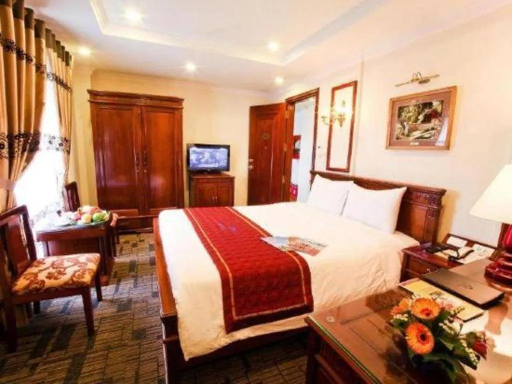 Bed in Eden Hotel Hanoi