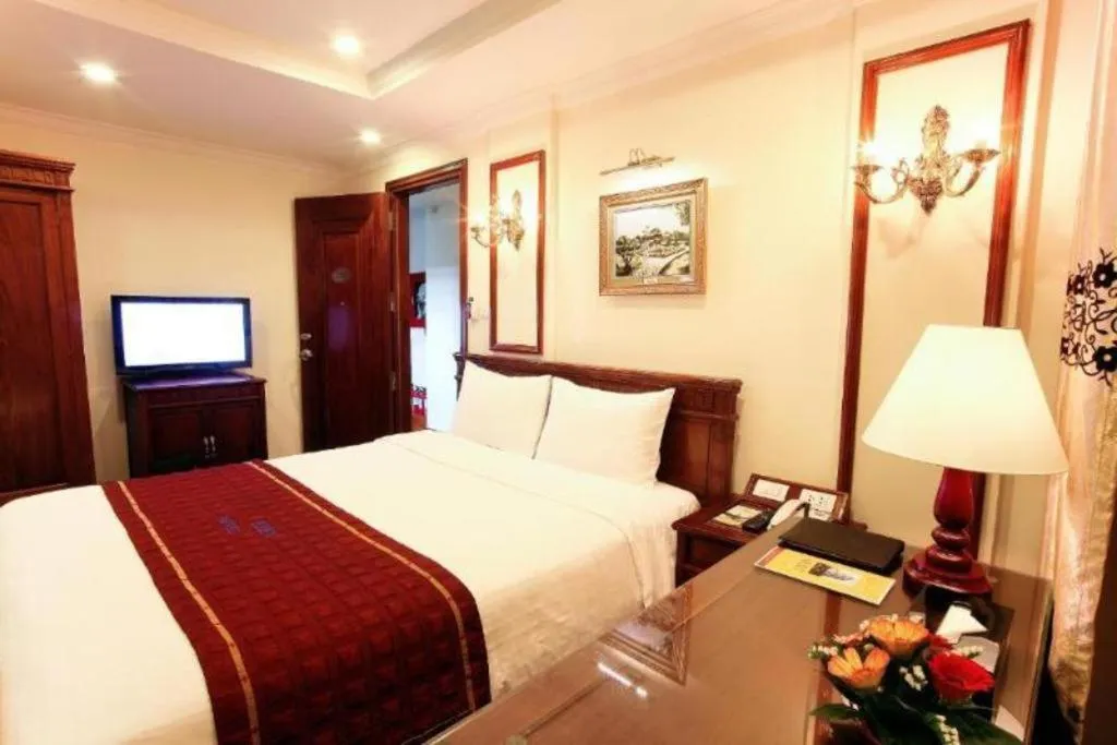 Bed in Eden Hotel Hanoi