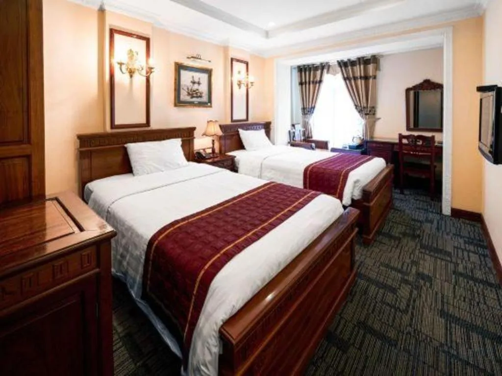 Bed in Eden Hotel Hanoi