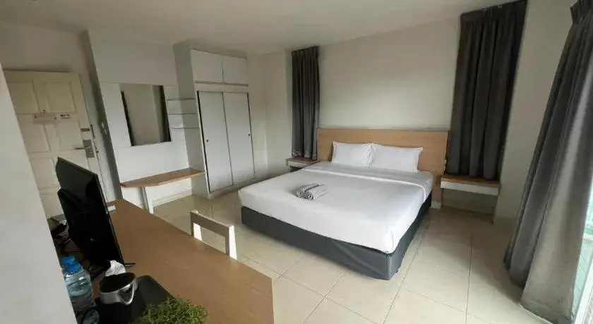 Bed in Nana Chat Bangsaen Hotel Bed in Nana Chat Bangsaen Hotel