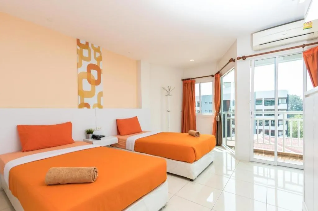 Bed in Nana Chat Bangsaen Hotel