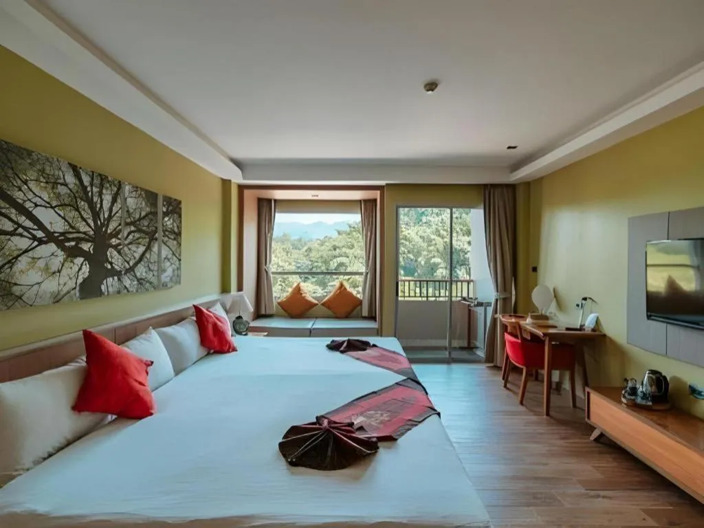 Bed in River Kwai Village Hotel