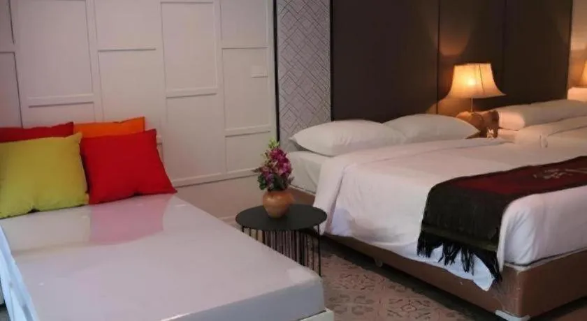 Bed in River Kwai Village Hotel