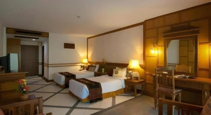 Bed in River Kwai Village Hotel