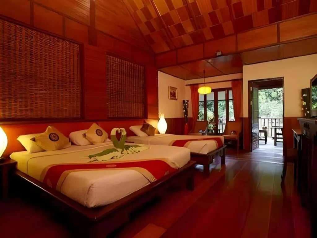 Bed in River Kwai Village Hotel