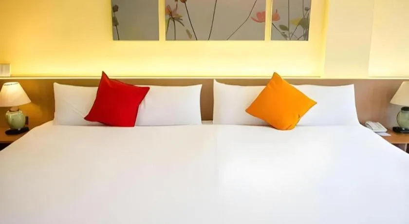 Bed in River Kwai Village Hotel