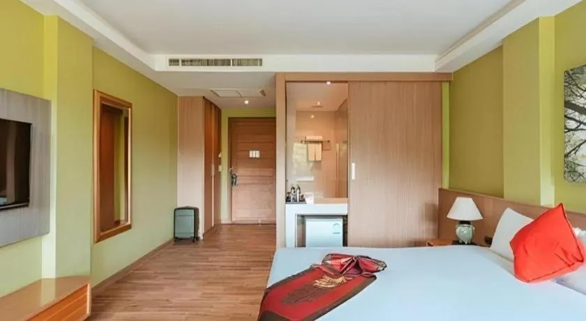 Bed in River Kwai Village Hotel