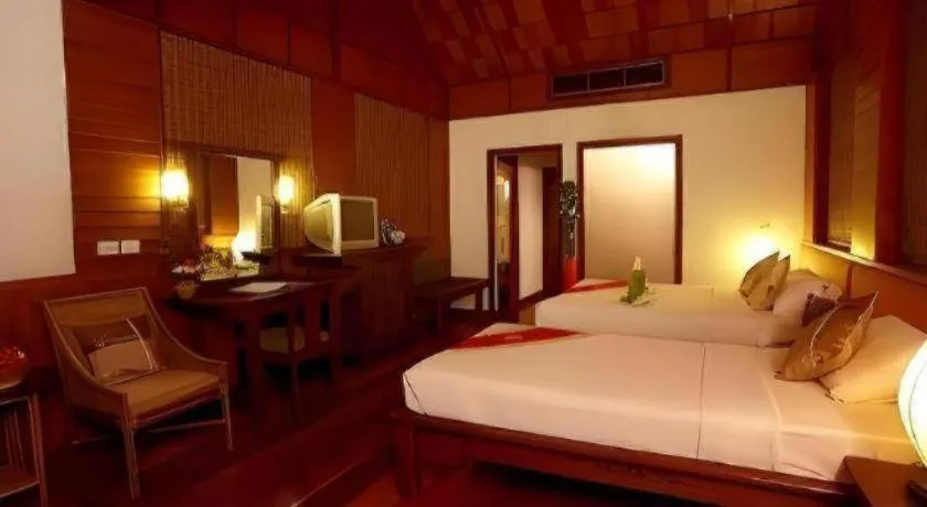 Bed in River Kwai Village Hotel