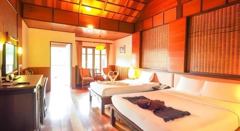 Bed in River Kwai Village Hotel