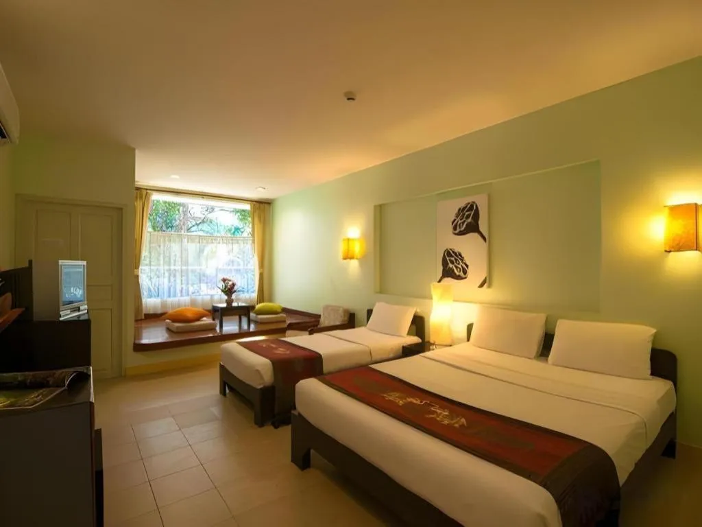 Bed in River Kwai Village Hotel