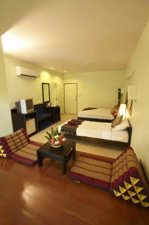 Bed in River Kwai Village Hotel