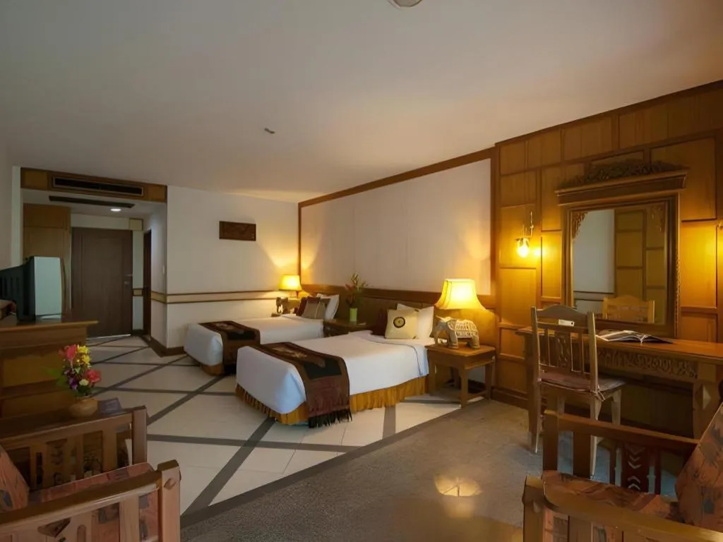 Bed in River Kwai Village Hotel