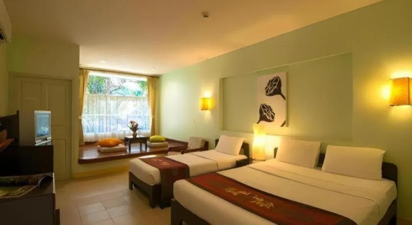 Bed in River Kwai Village Hotel