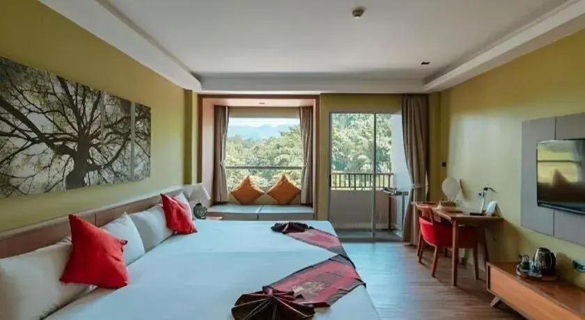 Bed in River Kwai Village Hotel Bed in River Kwai Village Hotel