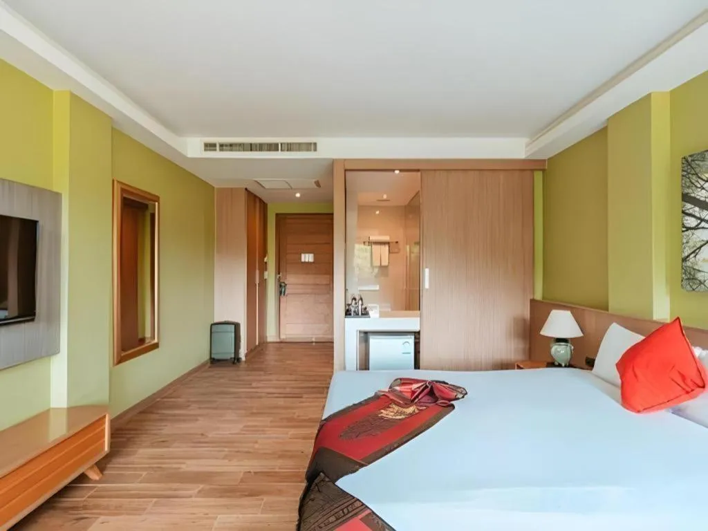 Bed in River Kwai Village Hotel