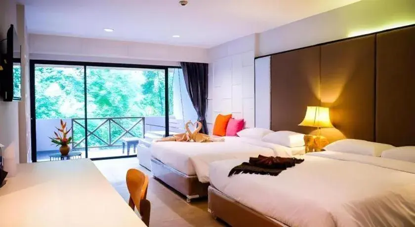 Bed in River Kwai Village Hotel Bed in River Kwai Village Hotel