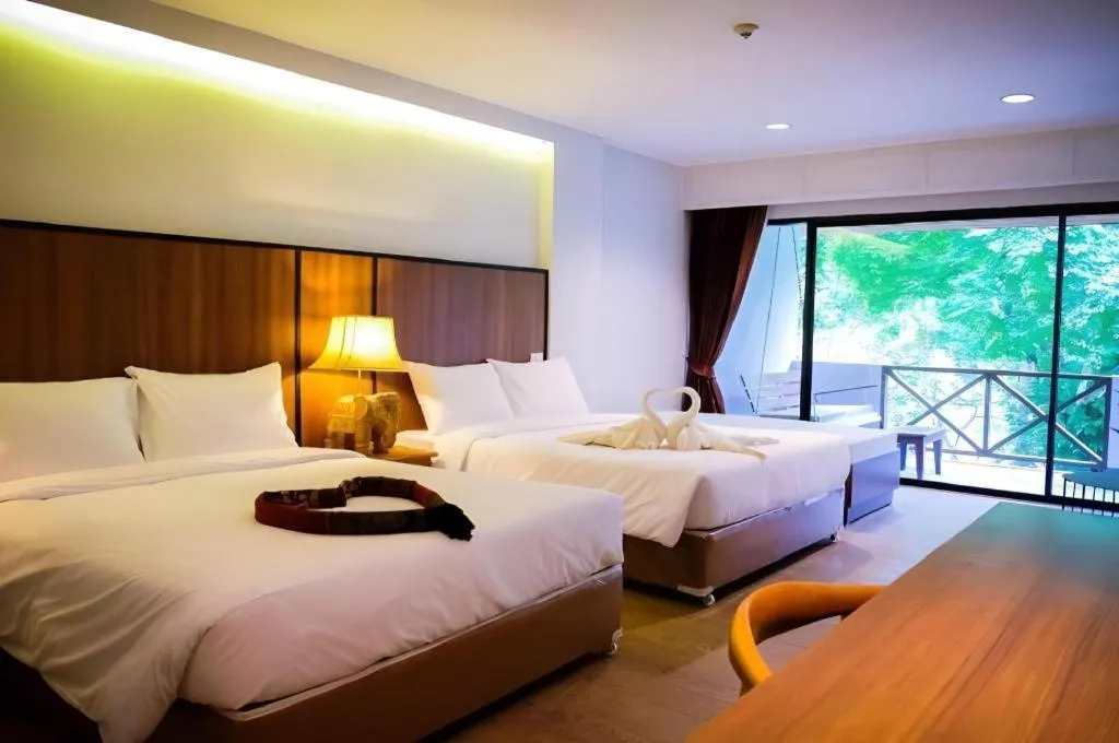 Bed in River Kwai Village Hotel