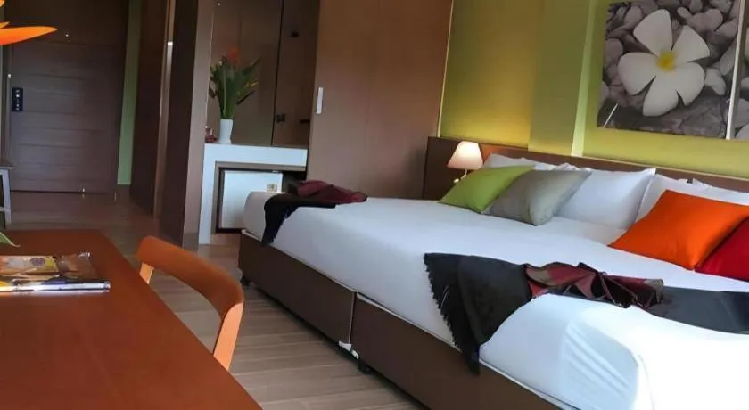 Bed in River Kwai Village Hotel