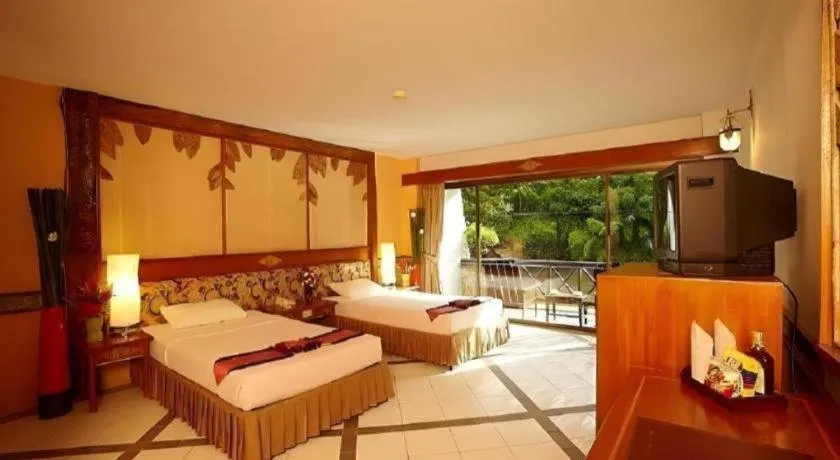 Bed in River Kwai Village Hotel