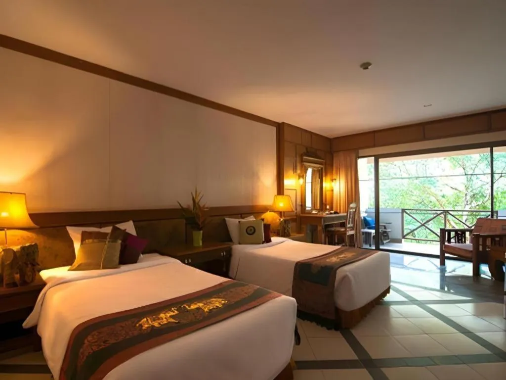 Bed in River Kwai Village Hotel