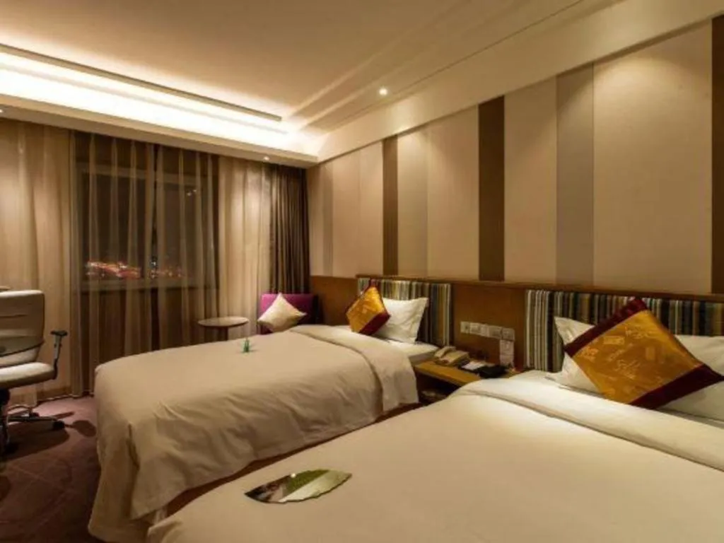 Bed in Grand Skylight Catic Hotel