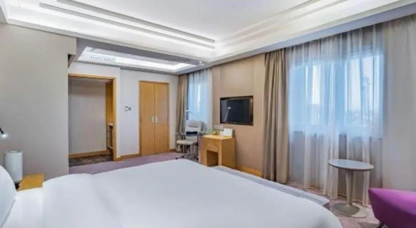 Bed in Grand Skylight Catic Hotel