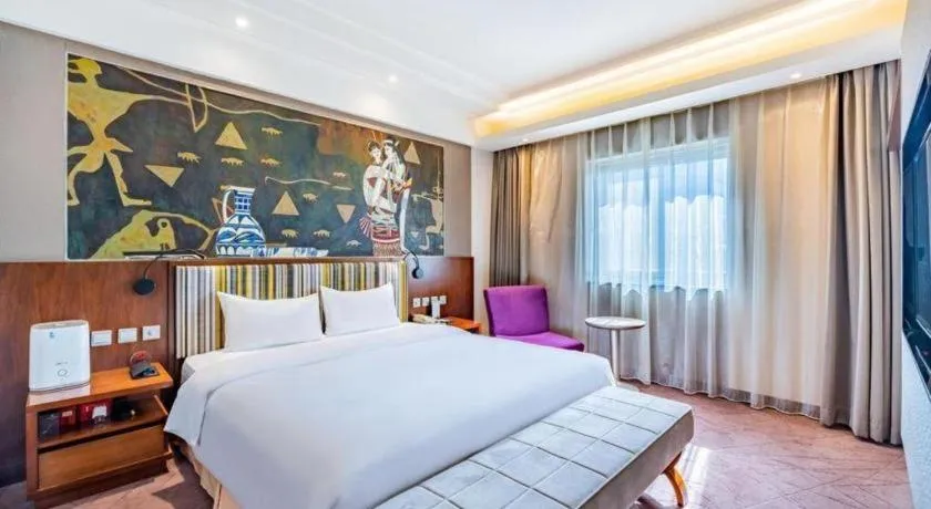 Bed in Grand Skylight Catic Hotel