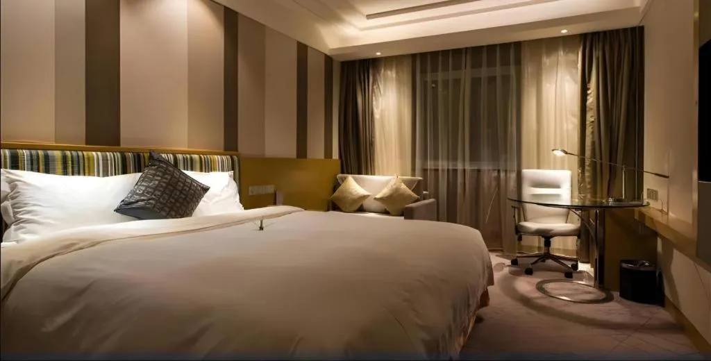 Bed in Grand Skylight Catic Hotel