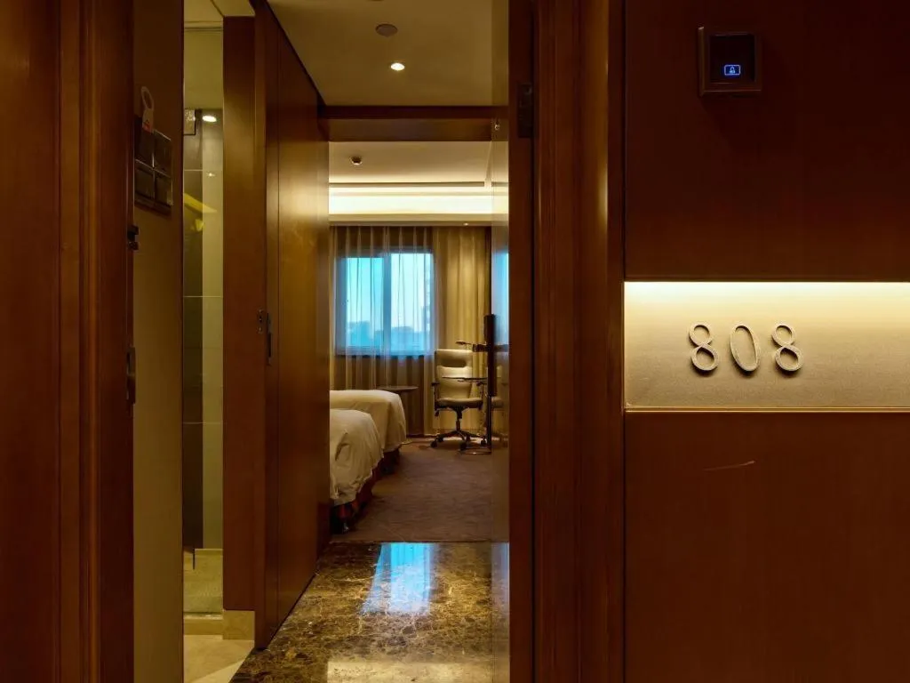 Bed in Grand Skylight Catic Hotel