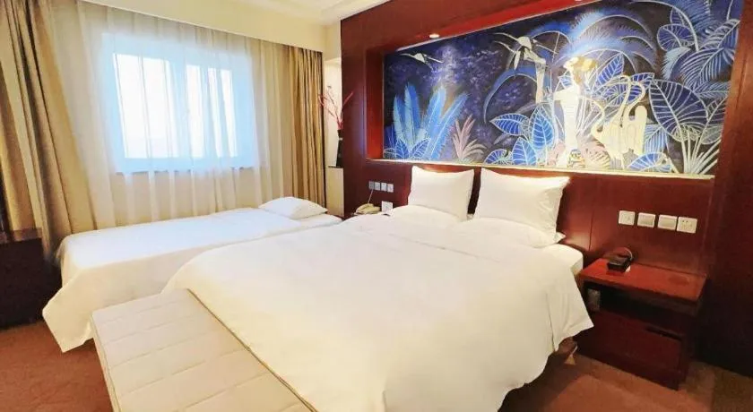 Bed in Grand Skylight Catic Hotel